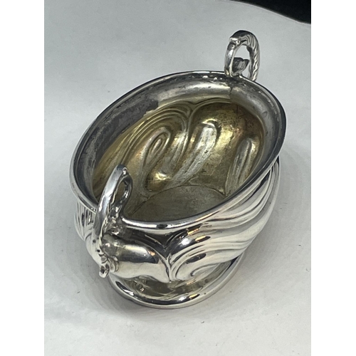 99 - A HALLMARKED BIRMINGHAM SILVER TWIN HANDLED OVAL SALT GROSS WEIGHT 43.5 GRAMS