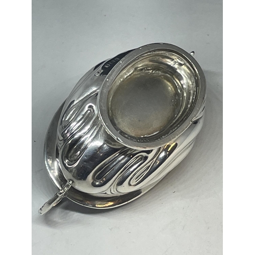 99 - A HALLMARKED BIRMINGHAM SILVER TWIN HANDLED OVAL SALT GROSS WEIGHT 43.5 GRAMS