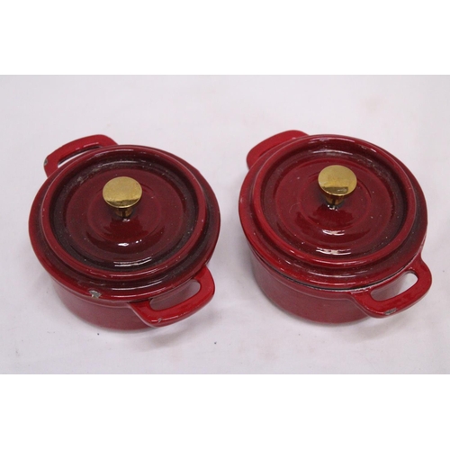 279 - TWO MINI CAST IRON LIDDED COOKING POTS