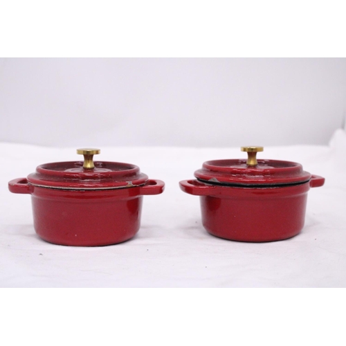 279 - TWO MINI CAST IRON LIDDED COOKING POTS