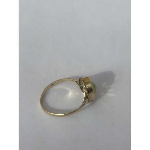 503 - A 14CT GOLD RING WITH A PERIDOT GEMSTONE, SIZE N, WEIGHT 1.65 G