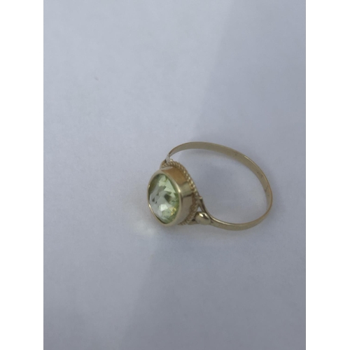 503 - A 14CT GOLD RING WITH A PERIDOT GEMSTONE, SIZE N, WEIGHT 1.65 G