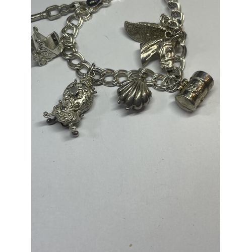 524 - A SILVER CHARM BRACELET