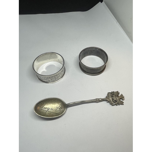 557 - TWO HALLMARKED SILVER NAPKIN RINGS ONE BIRMINGHAM AND ONE LONDON AND A BIRMINGHAM SILVER SPOON SILVE... 