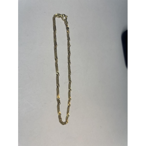 635 - A MARKED 14K BRACELET