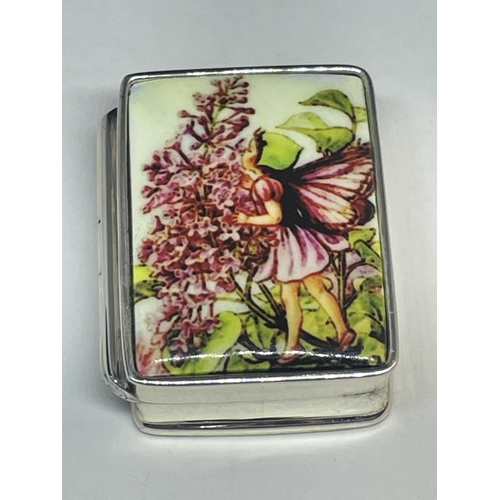 655 - A SILVER PILL BOX WITH ENAMEL FAIRY DESIGN TOP