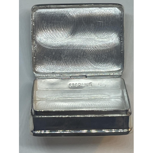 655 - A SILVER PILL BOX WITH ENAMEL FAIRY DESIGN TOP