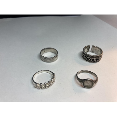 674 - FOUR VARIOUS SILVER RINGS