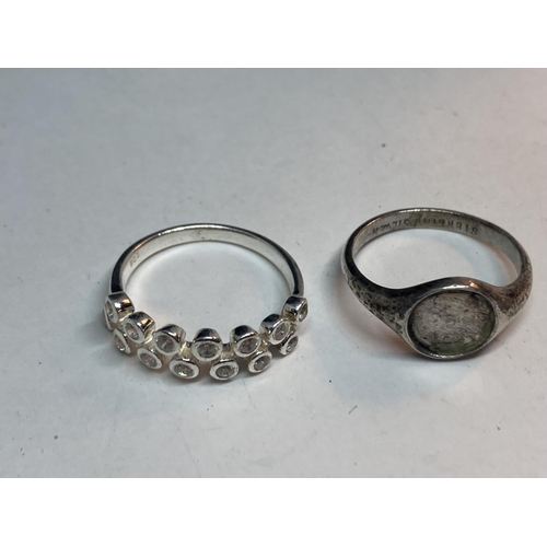 674 - FOUR VARIOUS SILVER RINGS