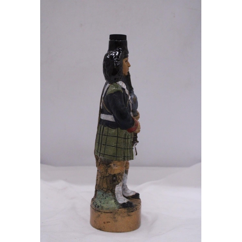 855 - A 1978 CERAMIC MILITARY BAGPIPER DECANTER, HEIGHT 32CM