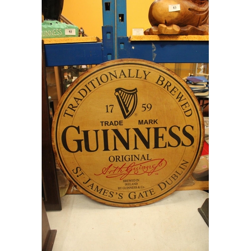 870 - A LARGE WOODEN CIRCULAR GUINESS ADVERTISING SIGN 24