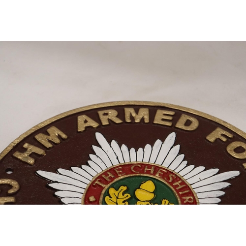 918 - A CAST 'HM ARMED FORCES' SIGN, DIAMETER 23CM