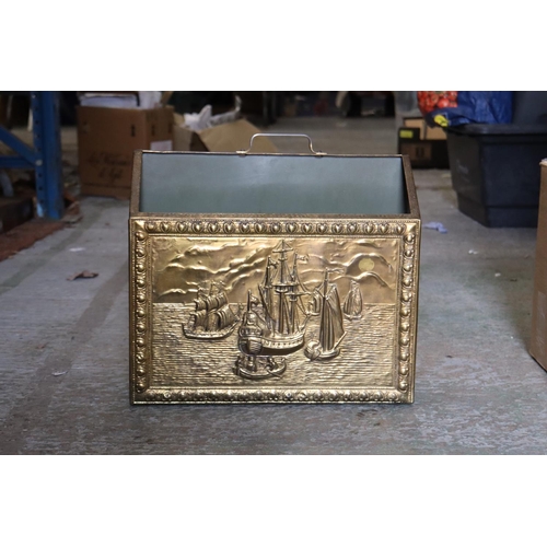 947 - A VINTAGE BRASS MAGAZINE RACK WITH GALLEONS IMAGE