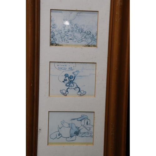 1126 - A PAIR OF DISNEY CARTOON SLIDES IN PINE FRAMES