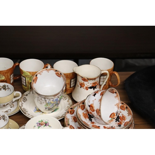 1185 - A MIXED LOT OF TEAWARE TO INCLUDE CUPS, SAUCERS, SIDE PLATES. CAKE PLATES, CREAM JUG SUGAR BOWL ETC