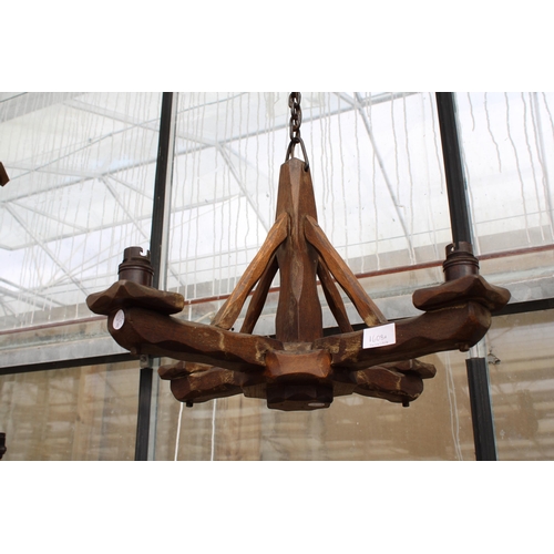 1608A - A VINTAGE STYLE FOUR BRANCH WOODEN CILIENG LIGHT FITTING WITH HANGING CHAIN