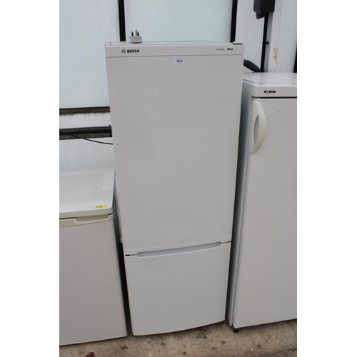 2314 - A TALL WHITE BOSCH UPRIGHT FRIDGE FREEZER