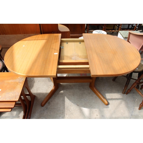 2536 - A RETRO TEAK EXTENDING DINING TABLE ON WHALE FIN LEGS, 52