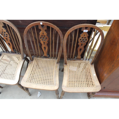 2616 - THREE WINDSOR STYLE WHEEL-BACK DINING CHAIRS WITH SPLIT CANE SEATS