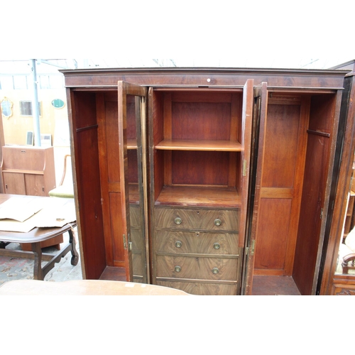 2718 - AN EDWARDIAN MAHOGANY DOUBLE MIRROR-DOOR WARDROBE ENCLOSING CUPBOARDS AND FOUR GRADUATED DRAWERS, 74... 