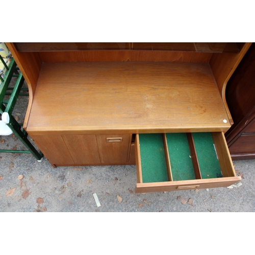 2730 - A RETRO TEAK UNIT WITH SMOKED GLASS DOORS, CUPBOARD AND DRAWERS TO BASE. 39.5