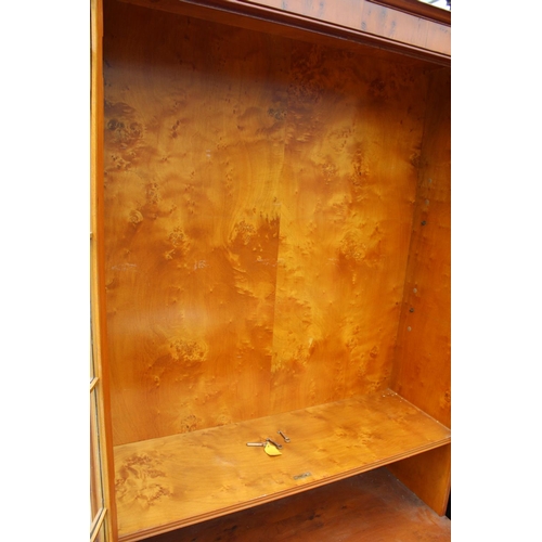 2798 - A MODERN ASTRAGAL GLAZED TWO DOOR CABINET ON BASE