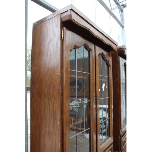 2803 - A MODERN OAK CABINET WITH GLAZED AND LEADED UPPER PORTION, 37