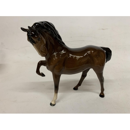 729 - A BOXED ROYAL DOULTON FIGURE OF A PRANCING STALLION