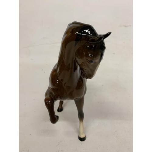 729 - A BOXED ROYAL DOULTON FIGURE OF A PRANCING STALLION