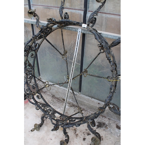 1502 - A LARGE HEAVY WROUGHT IRON 12 BRANCH CEILING LIGHT FITTING WITH HANGING BARS (D:146CM)