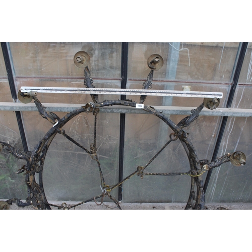 1502 - A LARGE HEAVY WROUGHT IRON 12 BRANCH CEILING LIGHT FITTING WITH HANGING BARS (D:146CM)