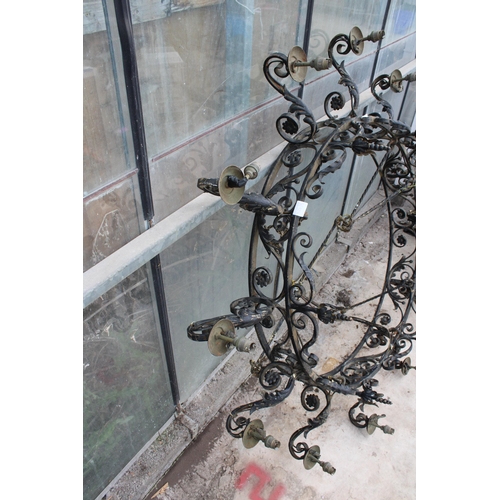 1502 - A LARGE HEAVY WROUGHT IRON 12 BRANCH CEILING LIGHT FITTING WITH HANGING BARS (D:146CM)