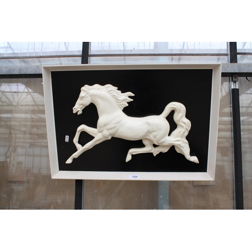 1520 - A FRAMED PLASTER GALLOPING HORSE