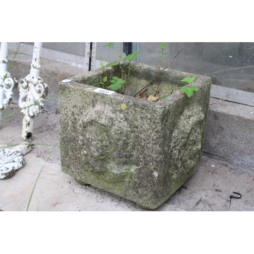 1522 - A SMALL RECONSTITUTED STONE PLANTER