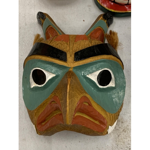 117 - A COLLECTION OF TRIBAL MASKS