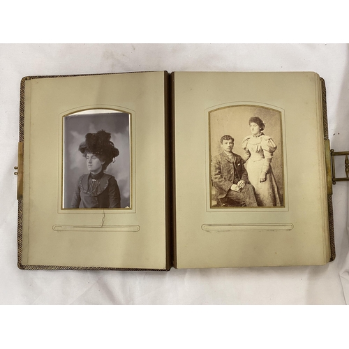 139 - A VICTORIAN LEATHERBOUND PHOTO ALBUM CONTAINING PHOTO'S