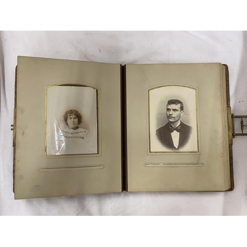 139 - A VICTORIAN LEATHERBOUND PHOTO ALBUM CONTAINING PHOTO'S