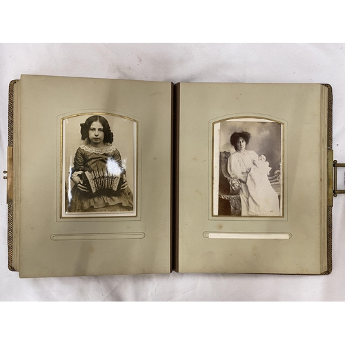 139 - A VICTORIAN LEATHERBOUND PHOTO ALBUM CONTAINING PHOTO'S