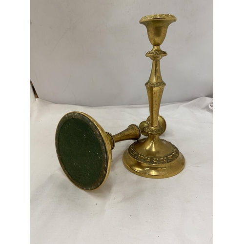 142 - TWO LARGE BRASS CANDLESTICKS 27 CM