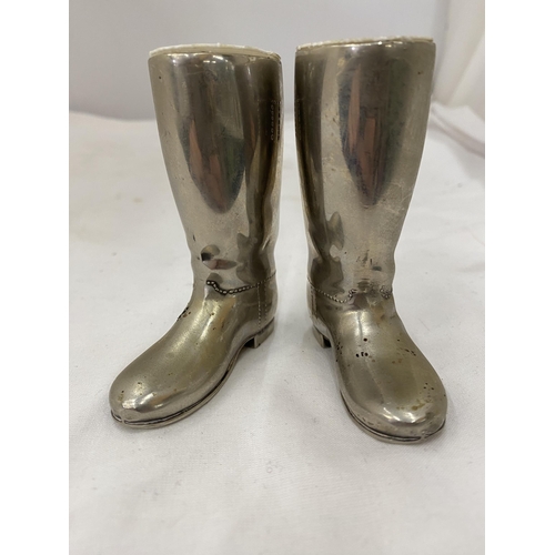 145 - A PAIR OF SILVER PLATED BOOT SALTS WITH INNERS