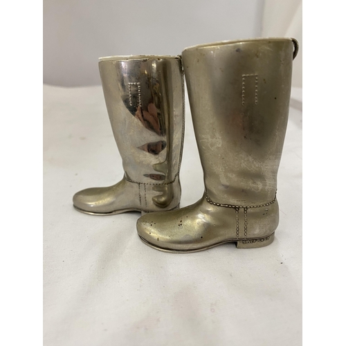 145 - A PAIR OF SILVER PLATED BOOT SALTS WITH INNERS