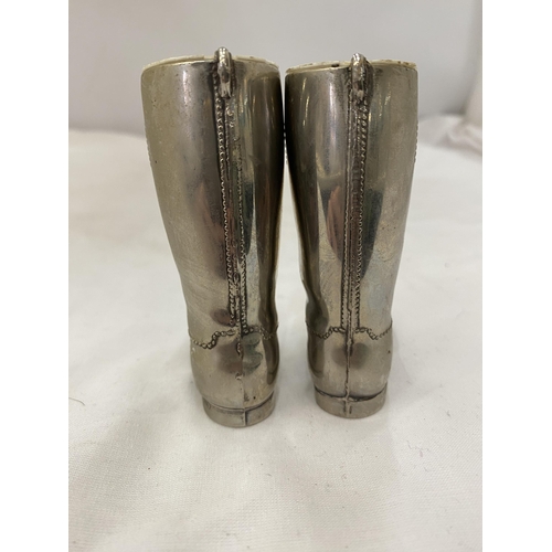 145 - A PAIR OF SILVER PLATED BOOT SALTS WITH INNERS