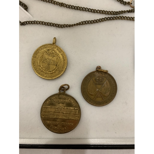 153 - A BOX CONTAINING FOUR IRISH UNIONIST PENDANTS