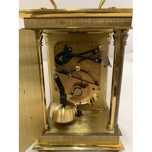 160 - AN 'ANSTEY WILSON' MECHANICAL CARRIAGE CLOCK, WITH PRESENTATION PLAQUE TO THE BACK