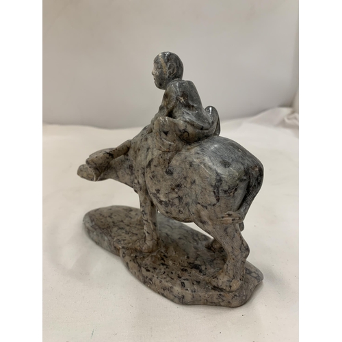 164 - A JADE ORIENTAL FIGURE OF A MAN ON A WATER BUFFALO, HEIGHT 14CM