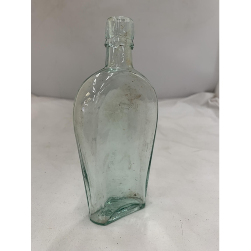 172 - A VINTAGE GERMAN BOTTLE WITH A GOLD SWASTIKA