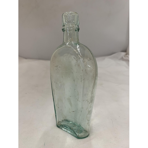 172 - A VINTAGE GERMAN BOTTLE WITH A GOLD SWASTIKA