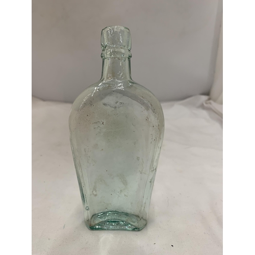 172 - A VINTAGE GERMAN BOTTLE WITH A GOLD SWASTIKA