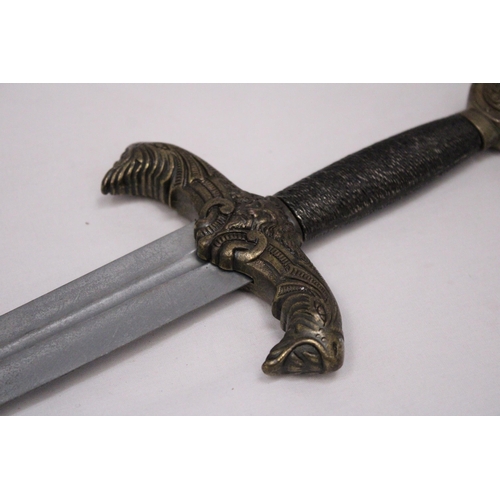 190 - A HEAVY MYTHOLOGY LONG DAGGER, LENGTH 42CM