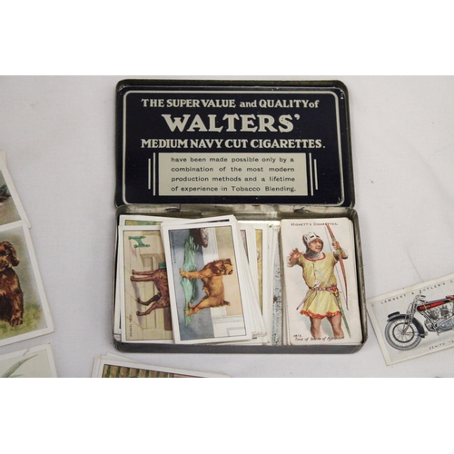 202 - A VINTAGE CIGARETTE TIN CONTAINING CIGARETTE CARDS